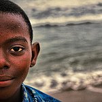 A little kid on the beach